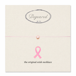 A pink wish necklace with a single pearl bead on a thin pink string, displayed on a cream-colored textured card. The card features the 'Dogeared' brand logo at the top and a pink ribbon graphic with the text 'the original wish necklace' at the bottom.